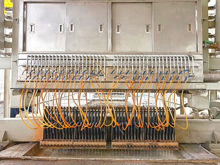 Vertical lifting hold-down block system